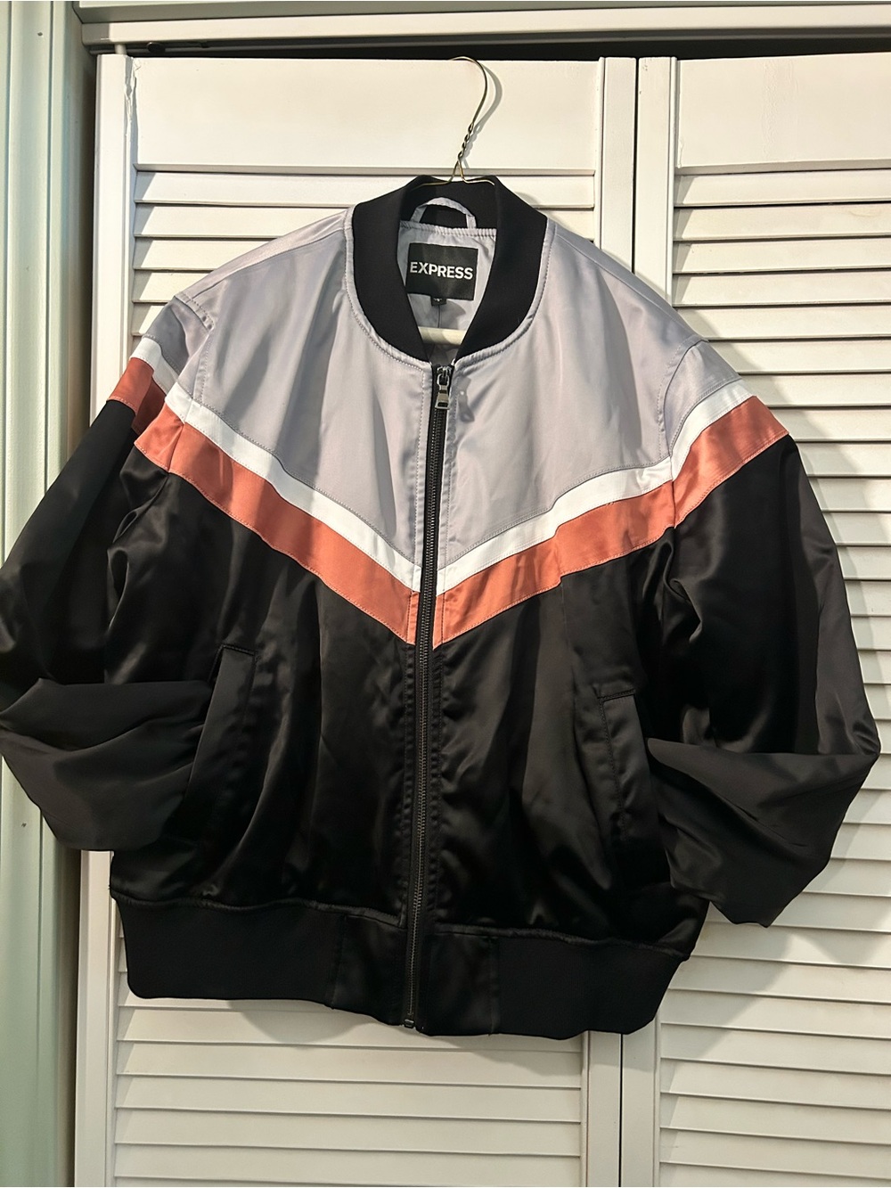 Express Womans Black Bomber Jacket with Gray and Orange Accent Stripes
